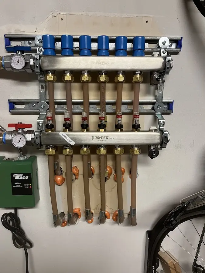 Plumber performing Gas Leak Detection at a residential property in Eveleth